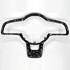 Contour des boutons de volant en carbone forgé à l'aspect marbré, présenté seul
