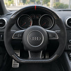 Volant carbone et alcantara monté dans une Audi TT 8J, vu depuis le siège conducteur