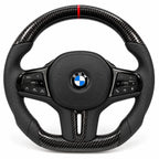 Version cuir perforé noir du même volant, haut et bas en carbone brillant, BMW G20