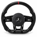 Volant carbone pour Mercedes Classe A W177, CLA et Classe C vu de face, côtés en alcantara noir, repère rouge au sommet